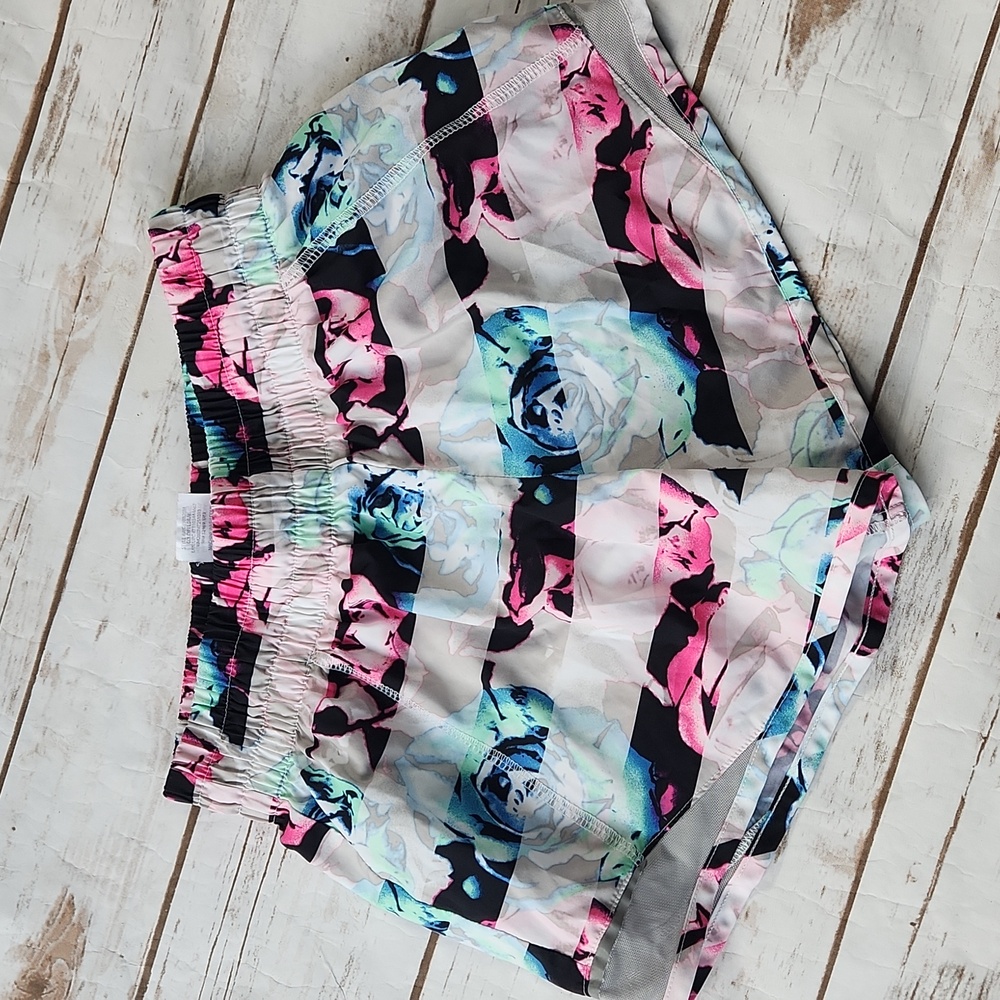 Girls floral athletic shorts. Sz large. 10 12
